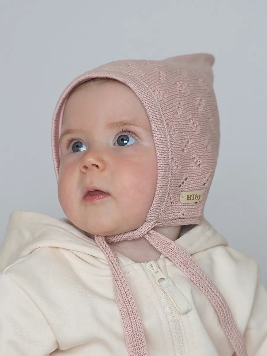 Шапка вязаная розовая